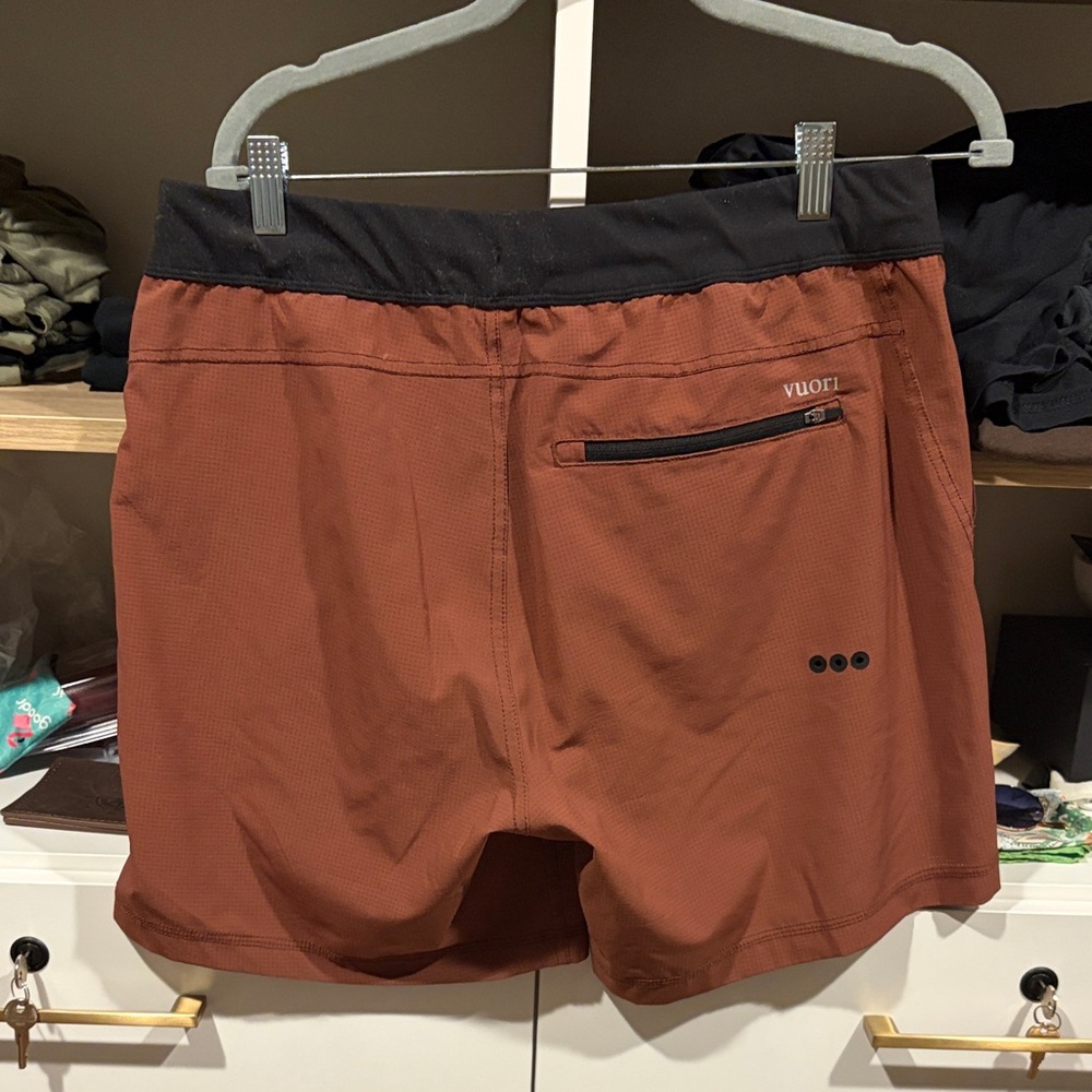 Vuori Men's Athletic Shorts in Rust with Black Accents - Picture 2 of 3